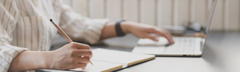 photo-of-person-writing-on-notebook-3758898.jpg